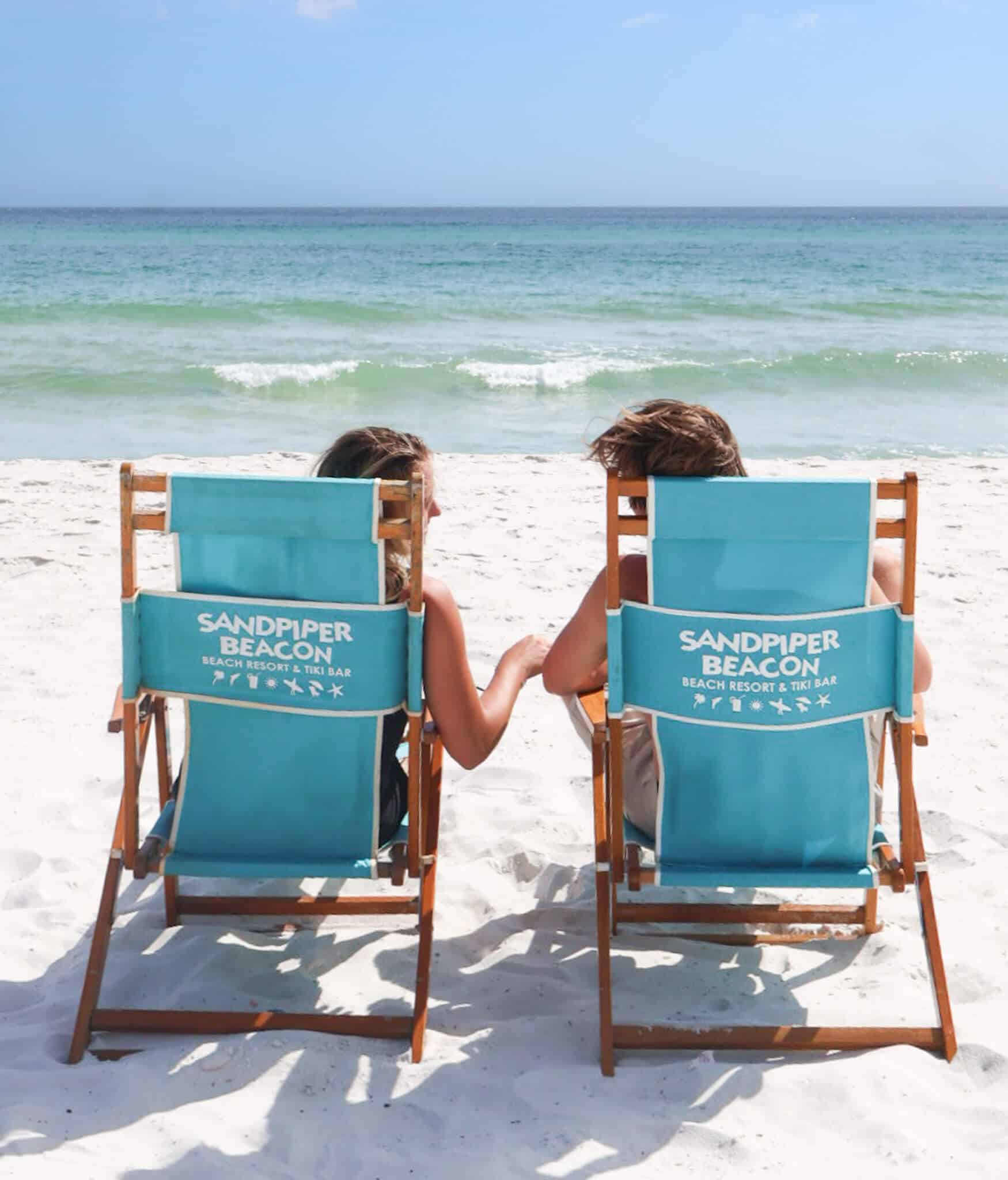 Couple Enjoying their Beachfront Stay at Sandpiper Beacon Beach Resort
